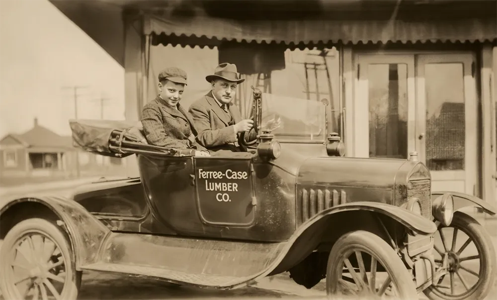 Photo Cleaning Father, Son in Car after